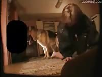 Woman making love with her german shepherd