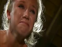 Extreme bdsm fetish movie features bound blonde coed taking brutal lashing from master